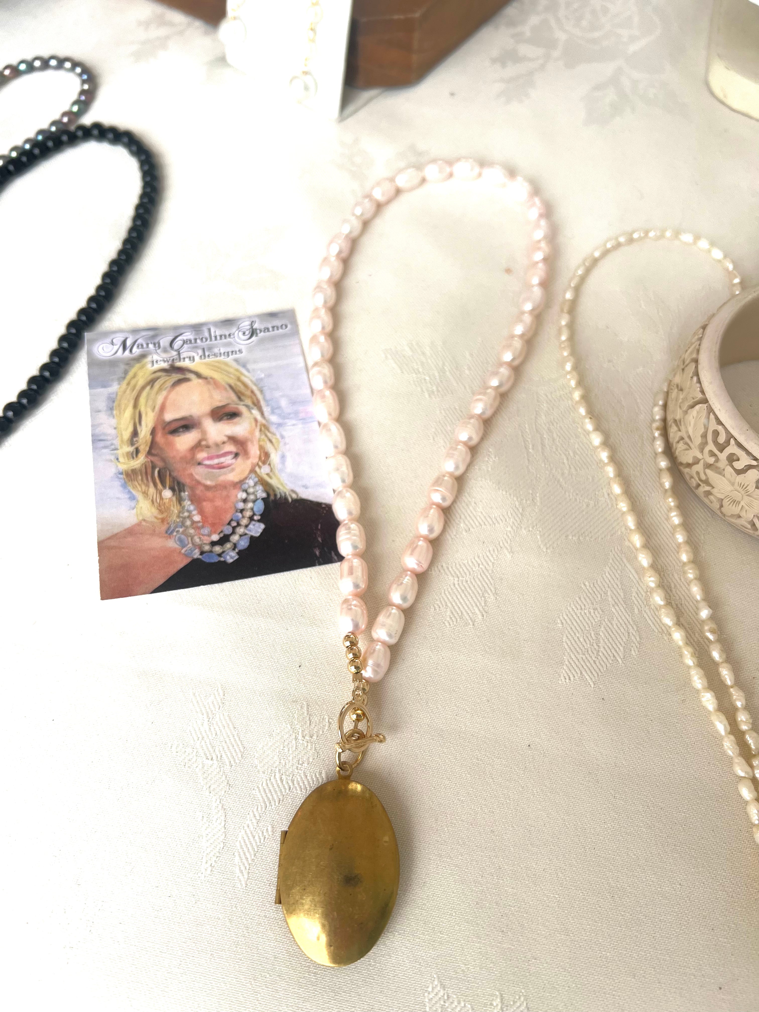 Soft pink freshwater pearl necklace with vintage locket pendant
